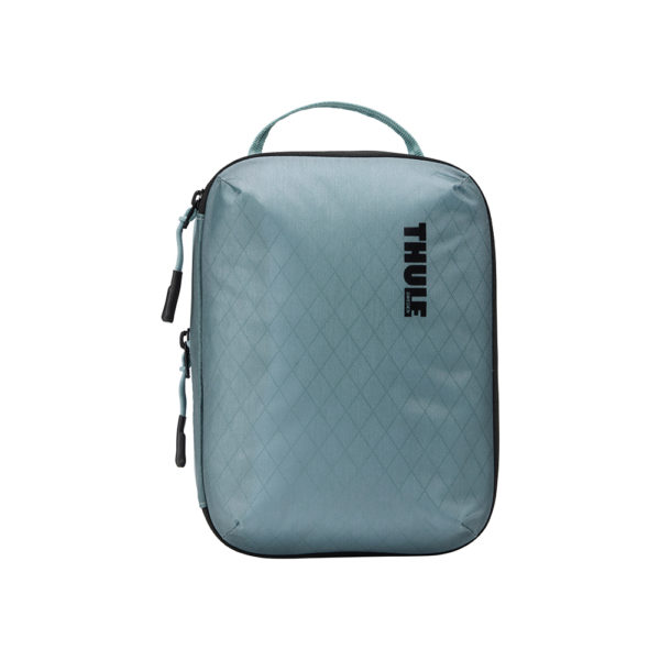 Rangez plus et mieux avec un cube de rangement semi-transparent qui s'agrandit et se rétrécit pour optimiser l'espace de rangement. THULE compression Cube Small PACK Blue