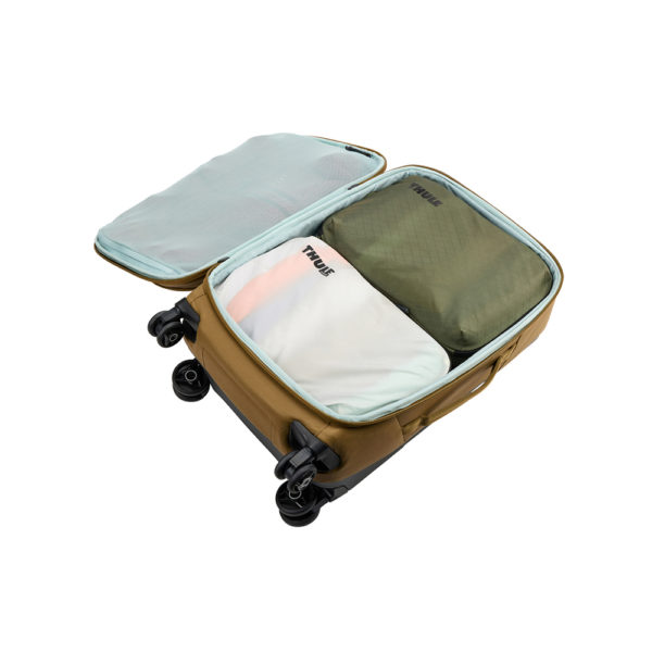 Rangez plus et mieux avec un cube de rangement semi-transparent qui s'agrandit et se rétrécit pour optimiser l'espace de rangement. Bagagerie calédonienne Voyage